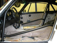 Roll cage 6 point bolt in with single door bars, with sunroof. Porsche 964 Roll cage 6 point bolt in with single door bars, with sunroof. Porsche 964