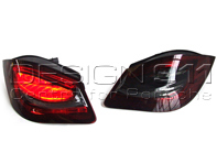 LED Rear Indicators Dark Smoked / Red Lens & Black Central Wedge Base Porsche 987 MKII / 987C MKII - 98763142703, 98763142803 LED Rear Indicators Dark Smoked / Red Lens & Black Central Wedge Base Porsche 987 MKII / 987C MKII - 98763142703, 98763142803